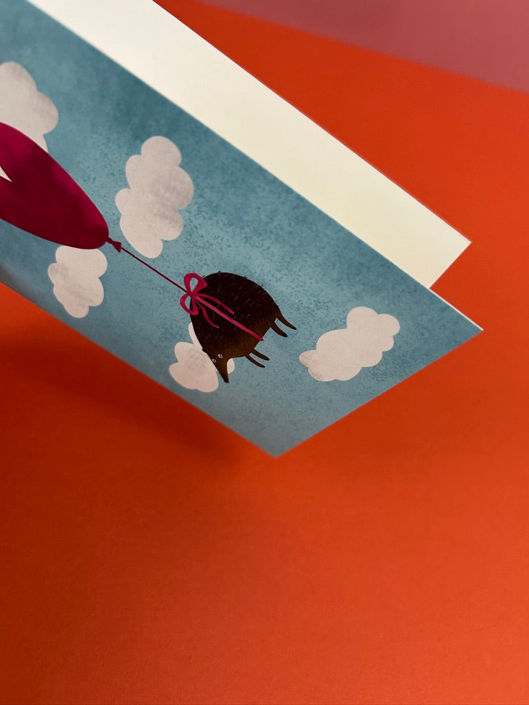 Hedgehog Floating in the Clouds Greeting Card