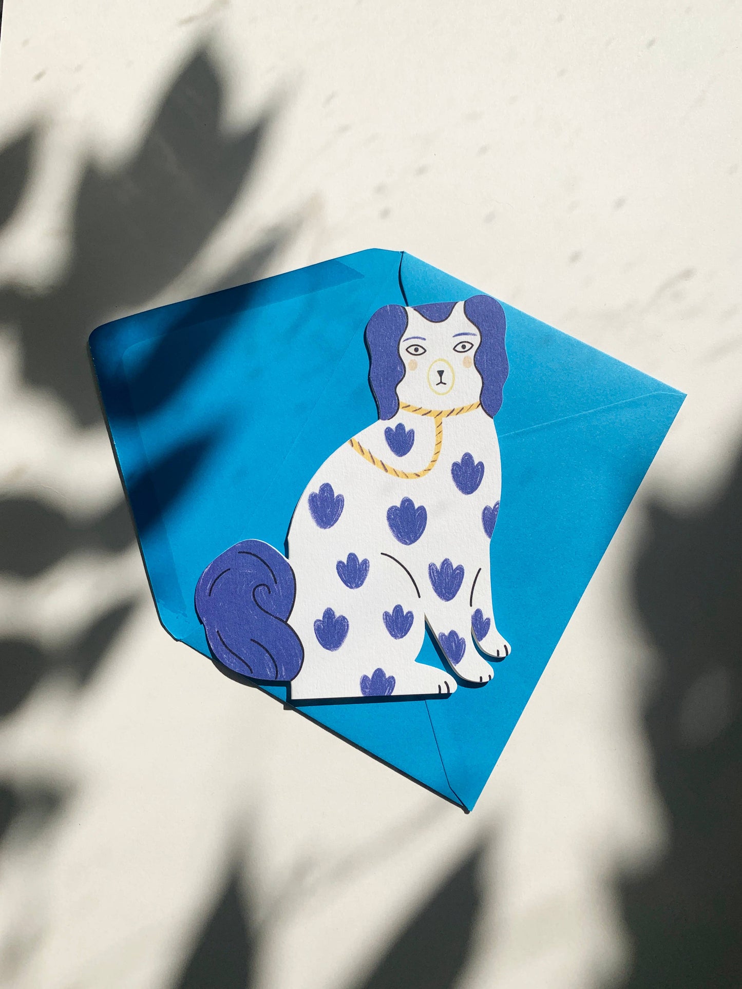 Blue Sitting Pottery Dog Shaped Card by Kitty Kenda