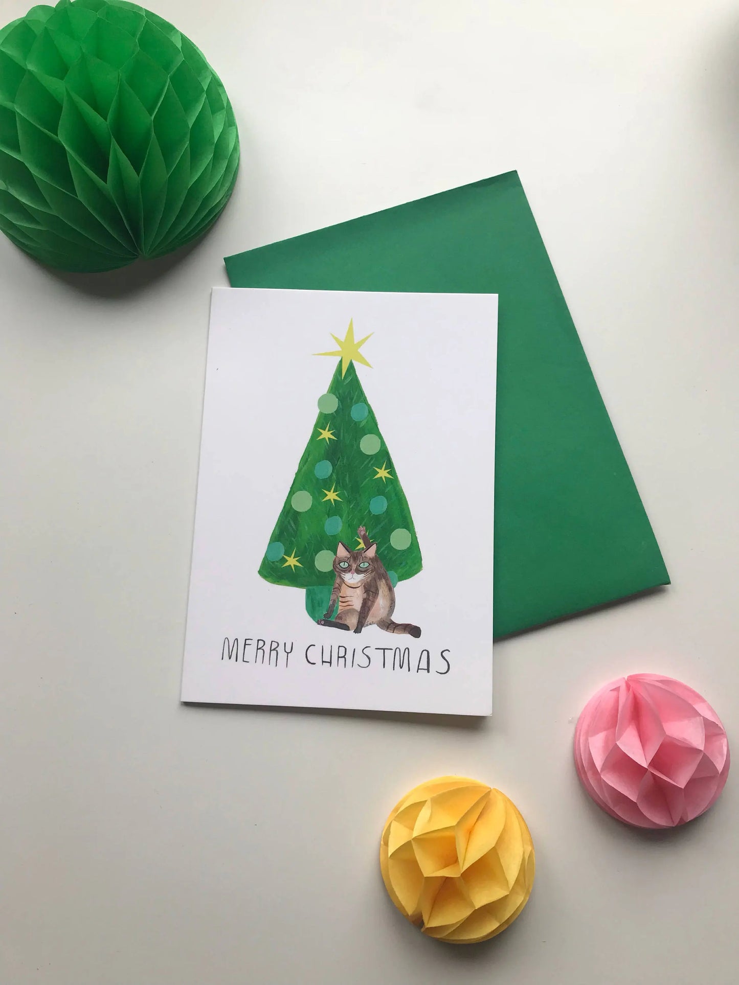 Cat Licking Christmas Greeting Card