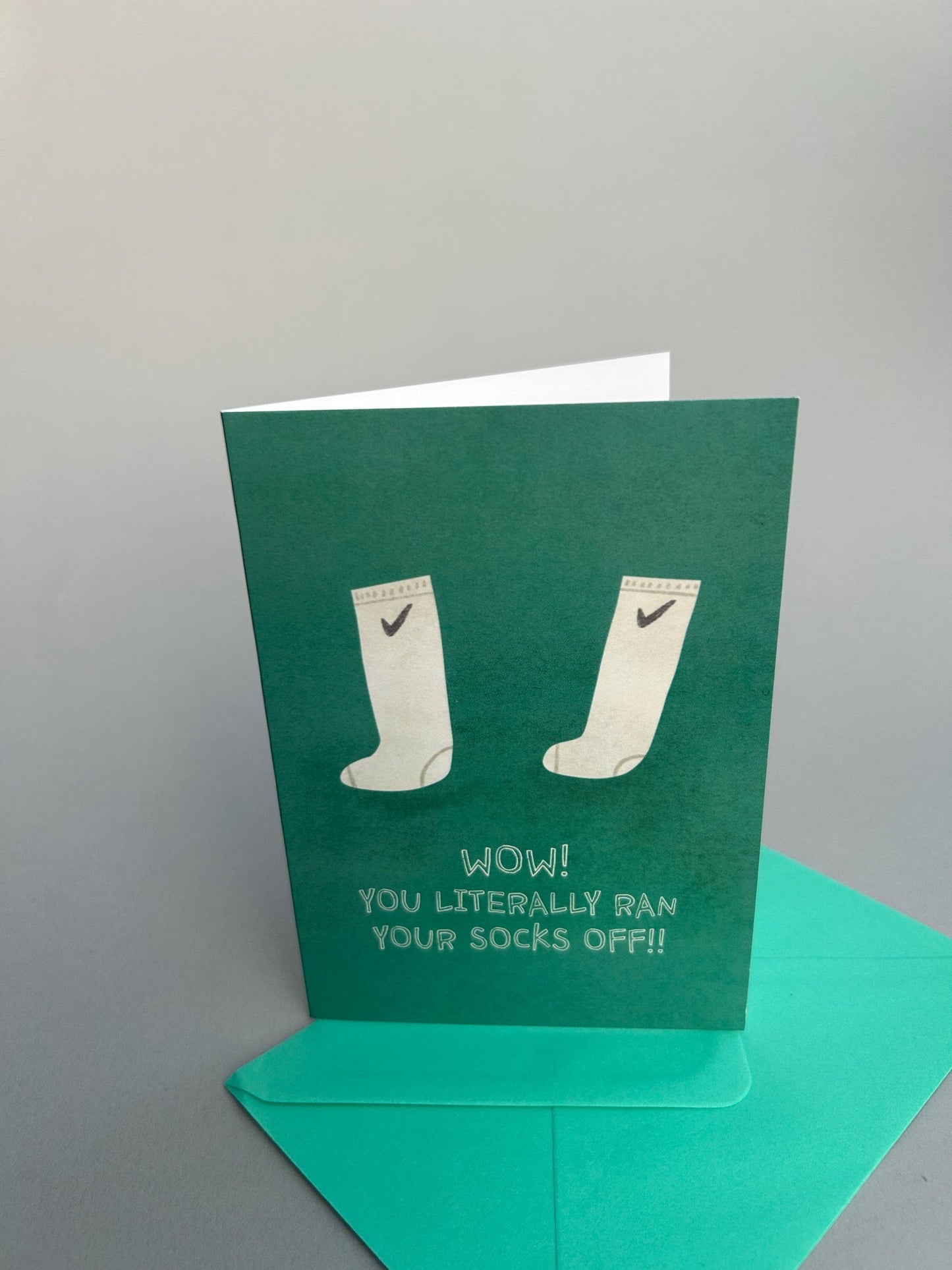 You Literally Ran Your Socks Off Greeting Card by Fernandes Makes