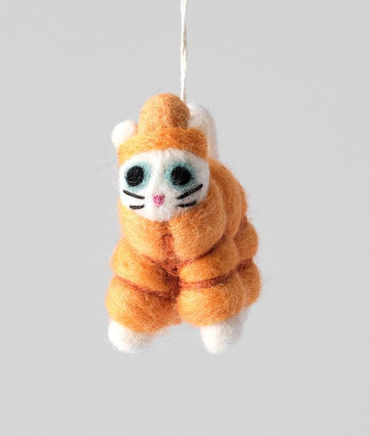Lee, Cat in an Orange Puffer Decoration